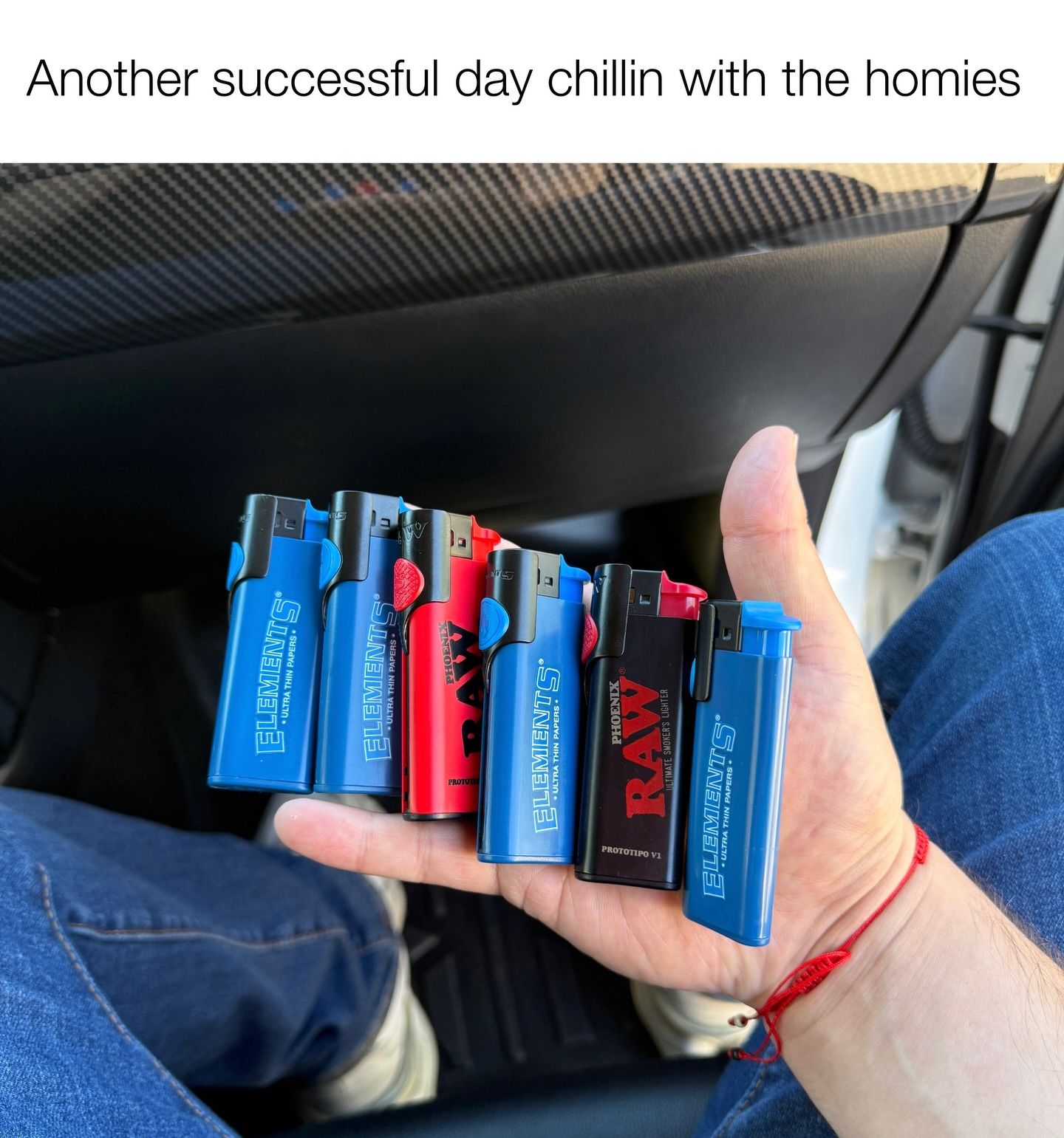 A hand holding six red and blue lighters with the caption "Another successful day chillin with the homies
