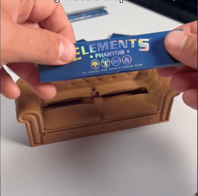 An Elements Papers Instagram post showing a hand holding a colorful pack of perforated filter tips, with four rolled tips in yellow, blue, orange, and pink
